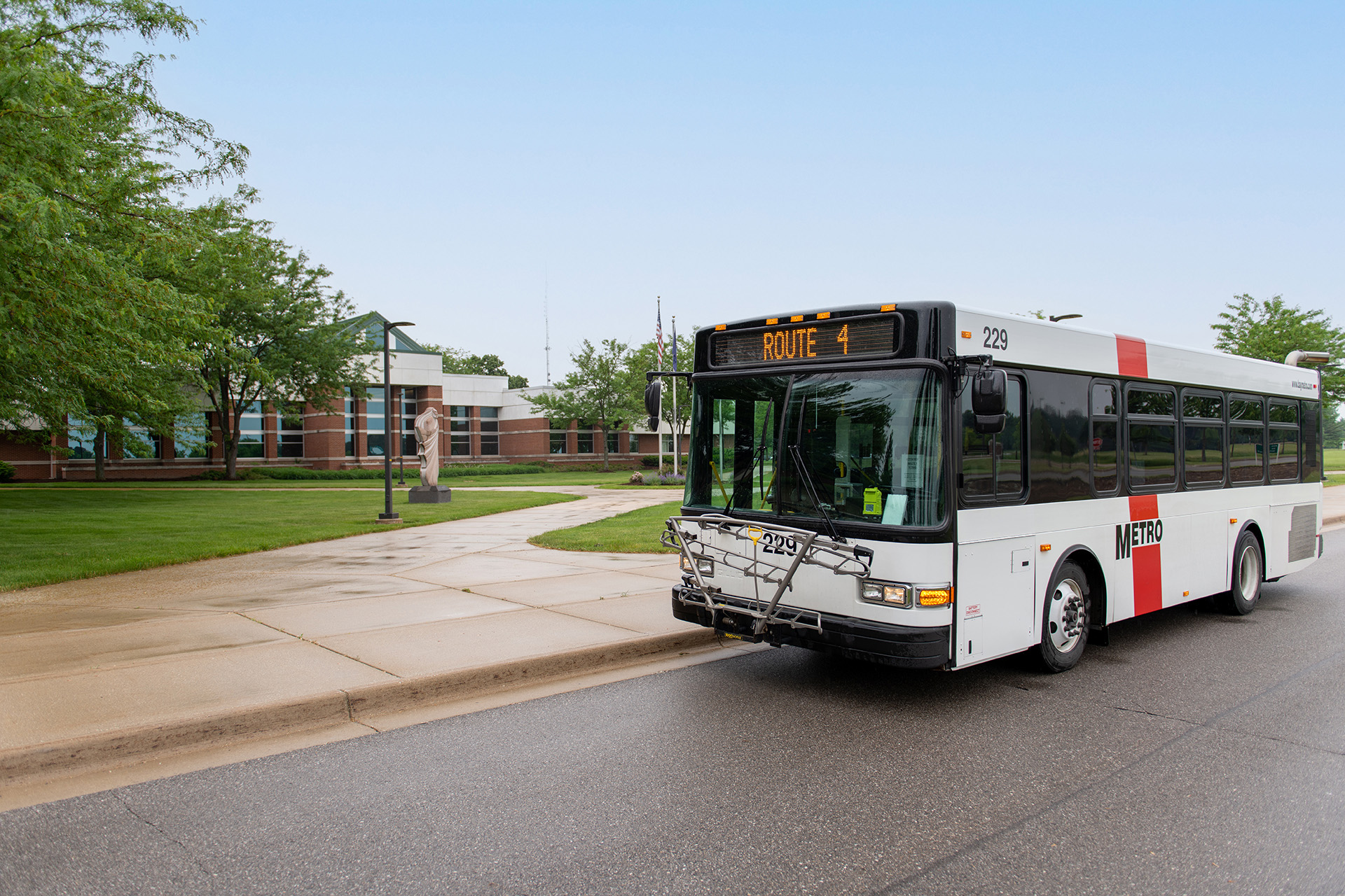Transcripts Metro bus in front of Delta's main campus
