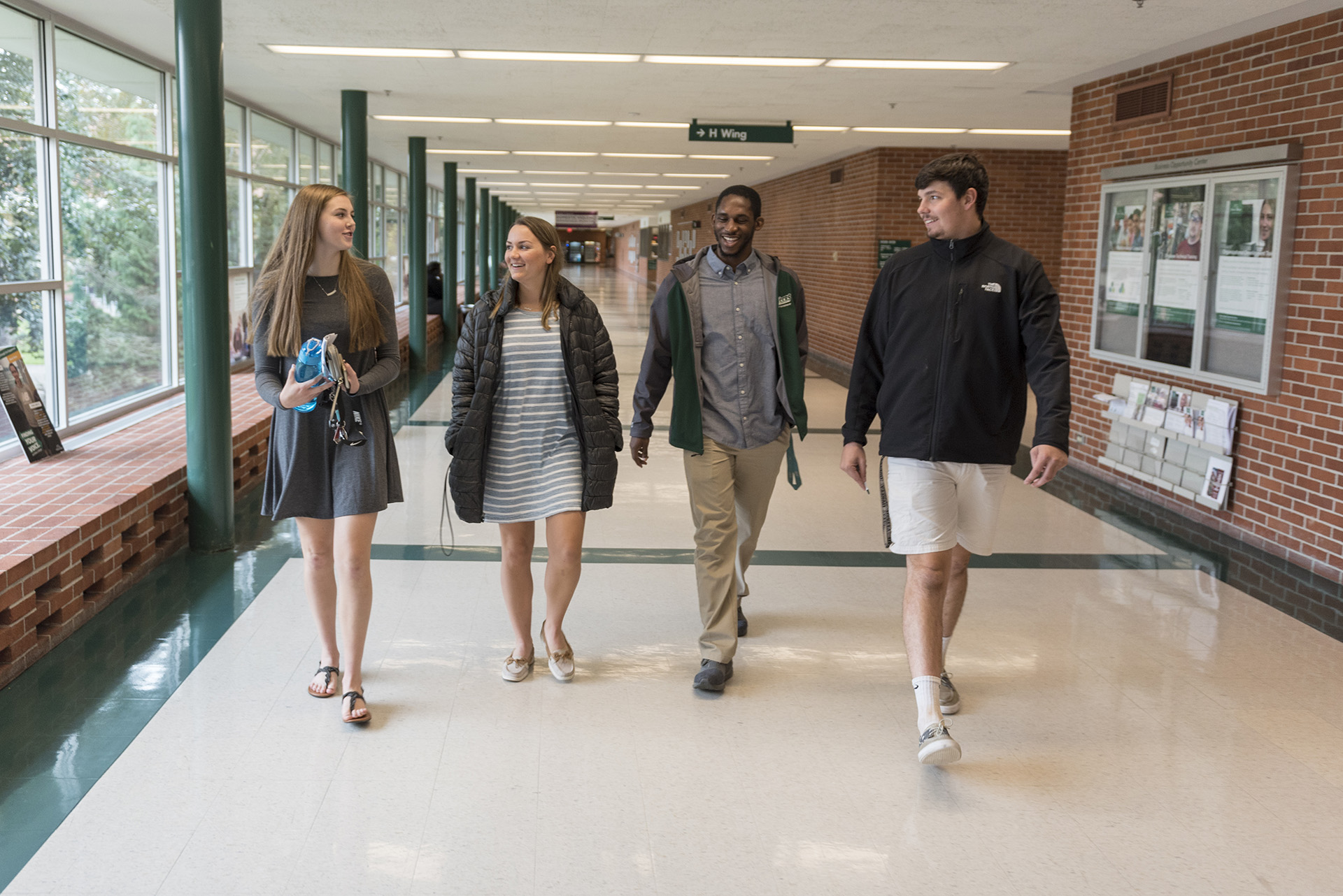 Students walking outside at Delta's Main Campus